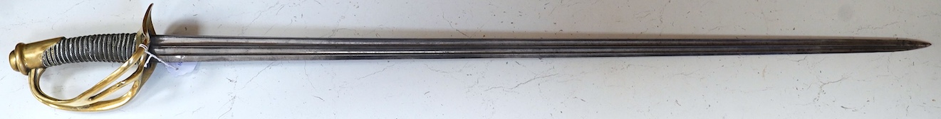 An 1854 Cuirassier's sword double fullered blade, blade faintly etched 1894? brass guard deformed, blade 94cm. Condition - fair